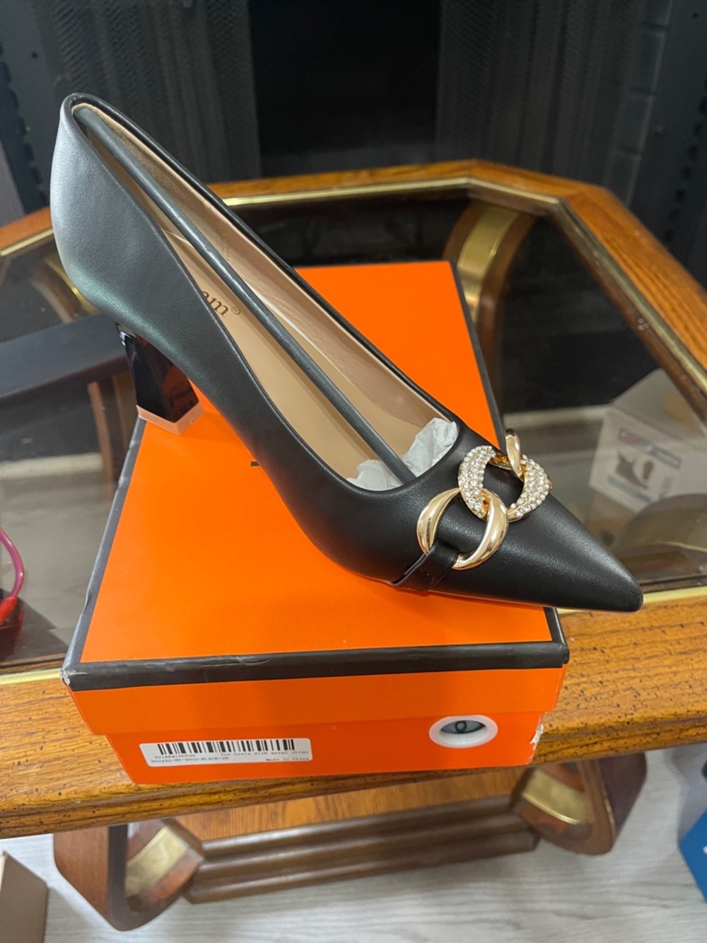 Black Pointed Leather Pump with Gold Crystal-Link Accent
